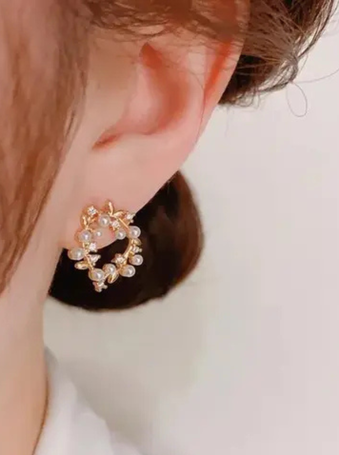 Royal style pearl and gold stud earrings for celebrations