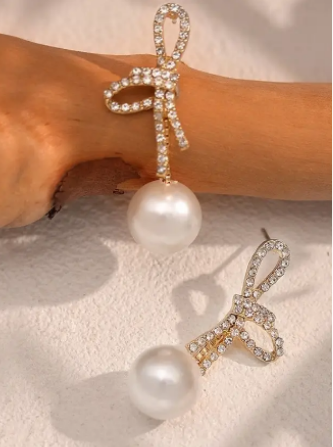 Elegant gold and pearl drop earrings for weddings