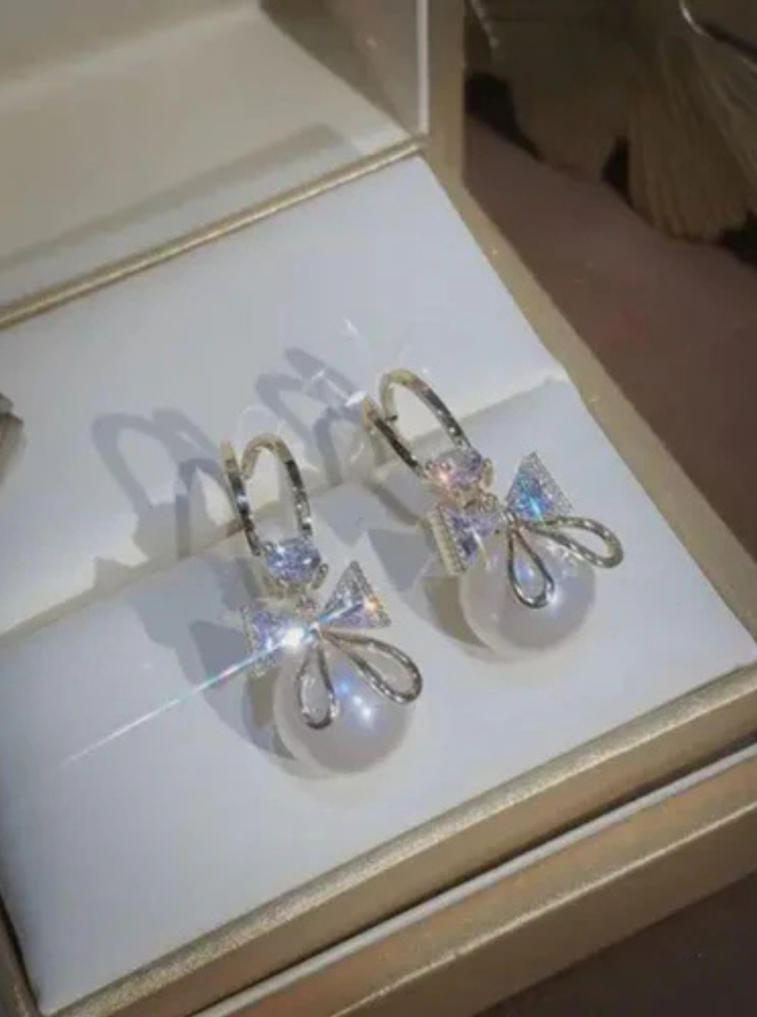 CRYSTAL-BOW PEARL EARRINGS