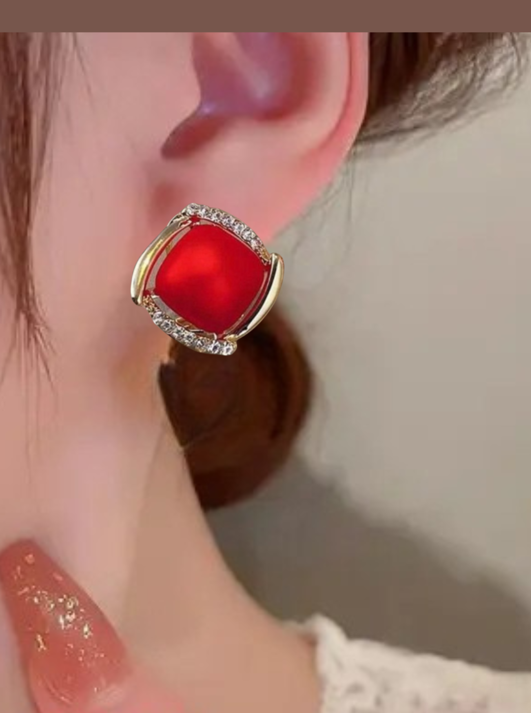 Scarlet gemstone stud earrings with sparkling zircons