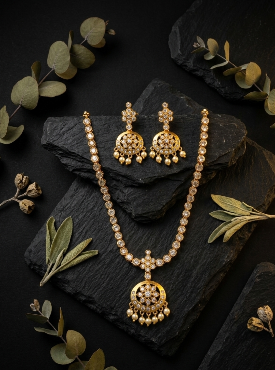 Gold finish AD necklace with circular pendant and pearl danglers
