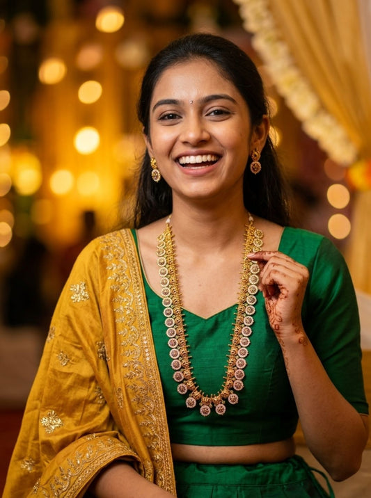 gold coin haar necklace with ruby stones