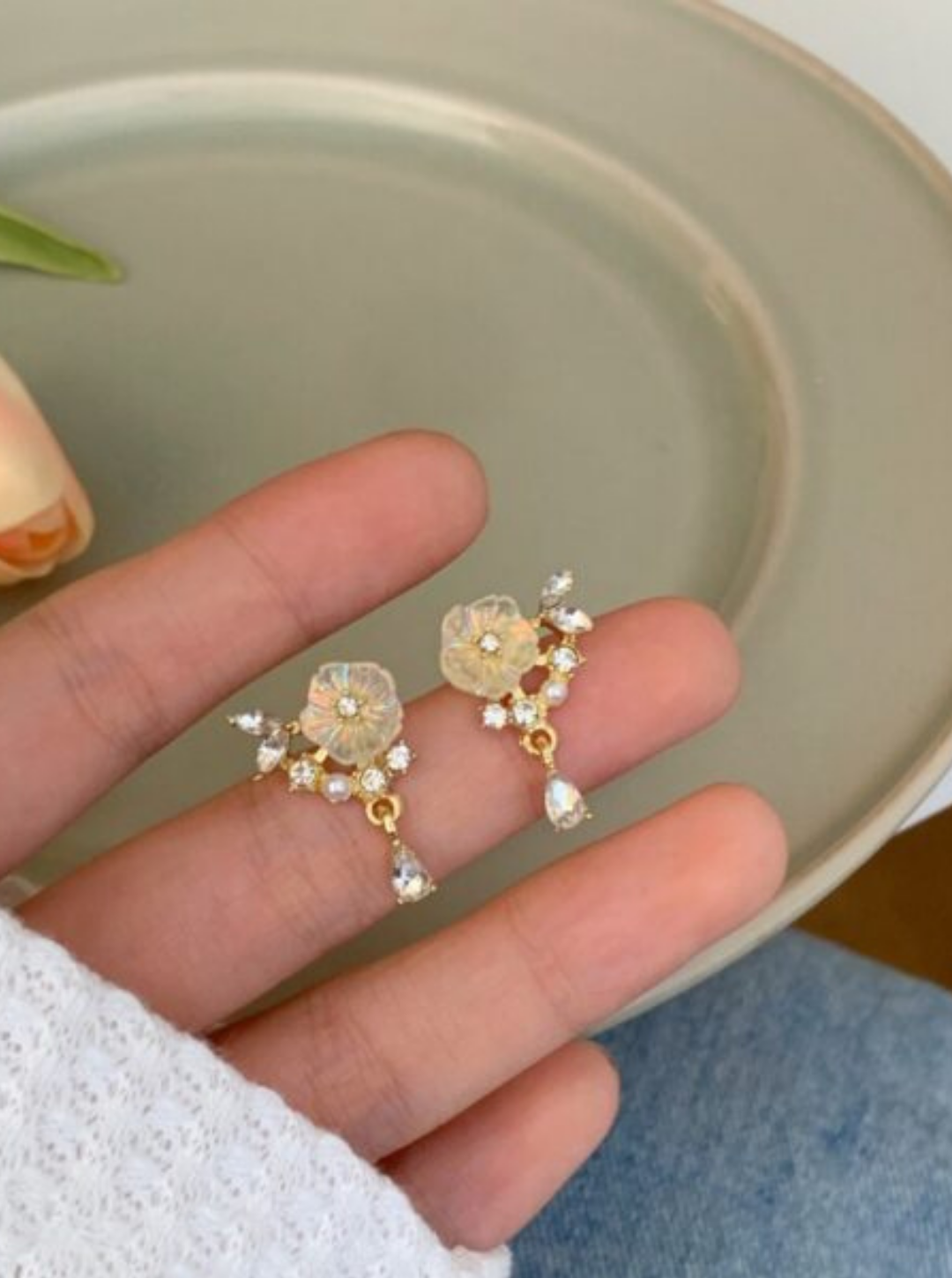 Floral pearl earrings with sparkling crystal stones