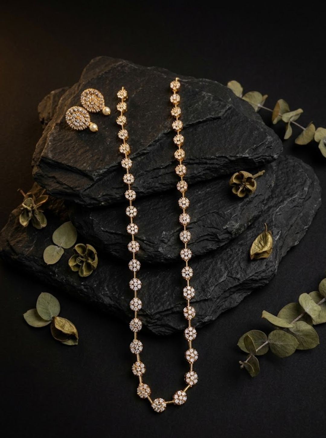 Long designer necklace with sparkling stones