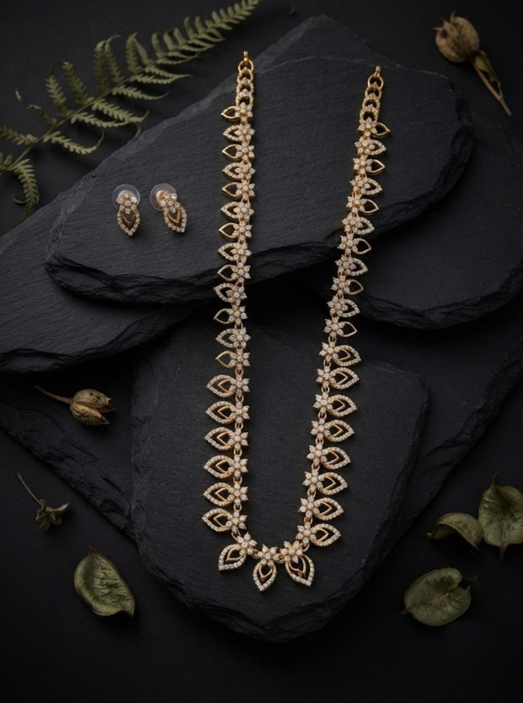Lightweight gold leaf necklace and matching earrings