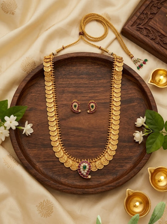 Traditional South Indian gold coin Kasu necklace with a mango paisley pendant.