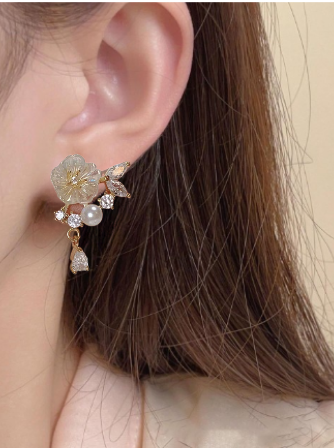 Translucent blossom pearl earrings for festive wear