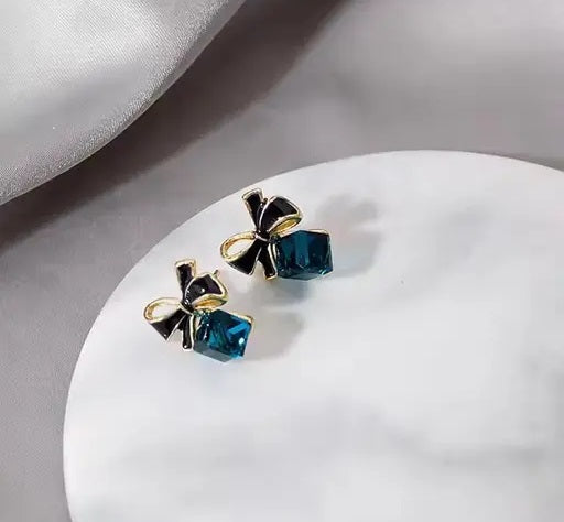 Midnight Ribbon black bow stud earrings with deep blue gem – Ladybreeze